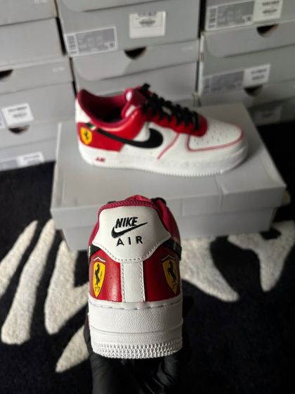 The heel view of the Ferrari custom sneaker, showing the logo and Italian flag detail.
