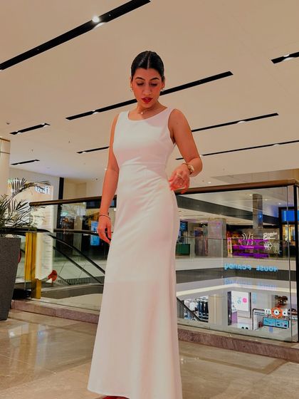 This plain white dress was in my closet for 7 years. I finally styled it for a salsa night with minimal jewelry and bold heels. It’s proof that clothes are just fabric; styling turns them into a statement.