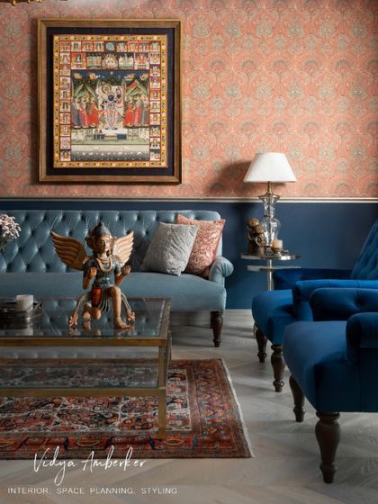 For this interior project, we curated and commissioned a custom Pichvai painting on the theme of Sharad Purnima. Crafted by artisans at Pichvai Tradition & Beyond, this piece is a spiritual anchor in our client's home.