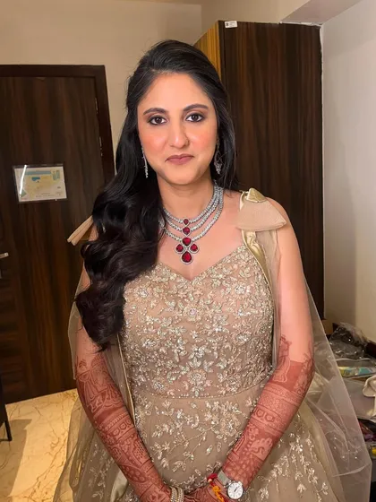 A confident portrait of the bride. The full glam look is perfectly balanced, ensuring she looks stunning without feeling overdone.