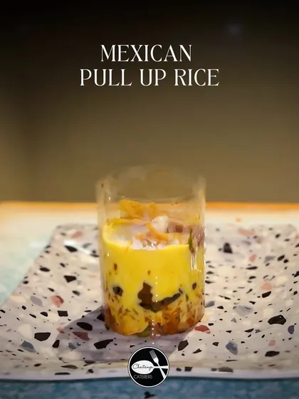 This still shot showcases the beautiful layers of my Mexican Pull Up Rice before the big reveal. You can see the seasoned rice, beans, and nacho toppings, all waiting to be enveloped in the cheesy sauce.
