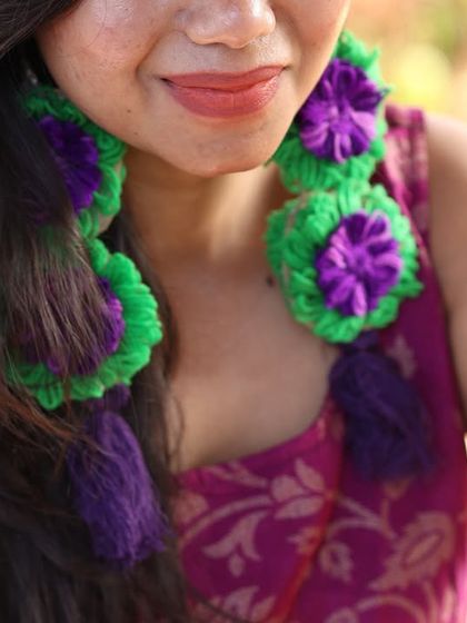 A close-up of the handmade floral jewelry I wore for my mehendi. I can help you choose songs and dance styles that complement your unique wedding look.