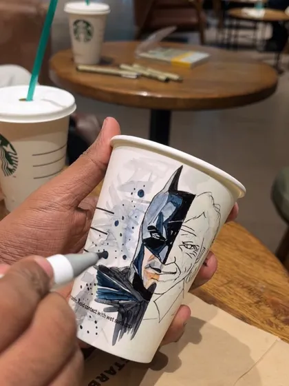 A process shot of the Batman and Joker coffee cup art. Here, I'm using brush markers to color the Batman side of the design.