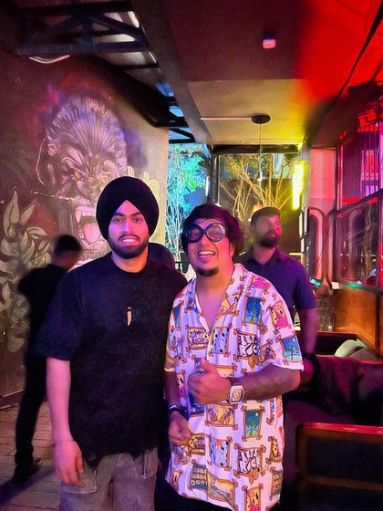 A photo from the Juss concert, with the venue's cool graffiti art in the background. These events bring a unique and powerful energy.