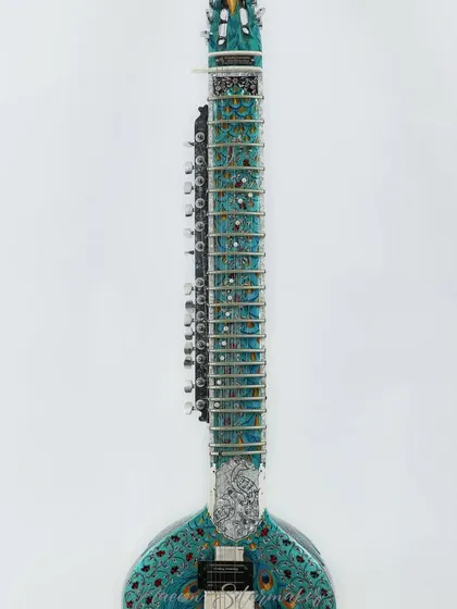 A full view of the stunning, fully decorated Peacock design sitar. This is a showpiece instrument that sounds as beautiful as it looks.