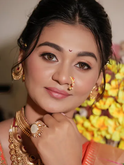 A detailed close-up of the flawless skin and eye makeup. I teach how to achieve this 'no-makeup' makeup look.