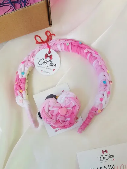 A perfect match! This is our K-Pop inspired Princess Braid headband paired with a matching heart-shaped hair tie. This combo is a huge hit and adds a fun, colorful touch to any hairstyle.