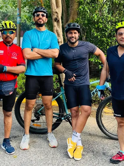 Four members of our cycling crew. The different jerseys and gear reflect the individuality we celebrate within our team.