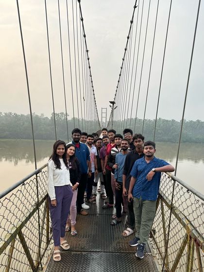 Our group on the suspension bridge, a classic photo spot on our Gokarna itinerary.