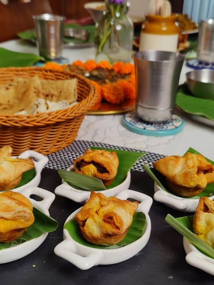 Bite-sized appetizers perfect for your gatherings. These are little puff pastry bites filled with deliciousness. You can order them by the dozen for any function.