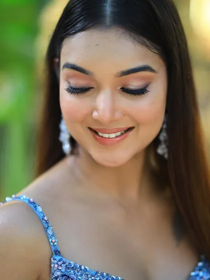 A close-up of this model's subtle makeup, perfect for a cocktail party or reception.