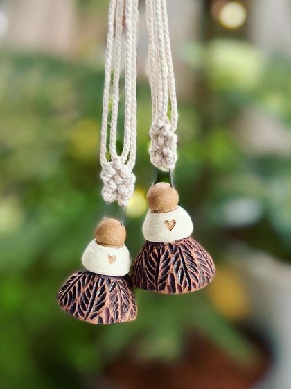 A throwback to my Christmas collection from last year. This image of handmade bells captures the festive and creative spirit that we nurture in the studio.