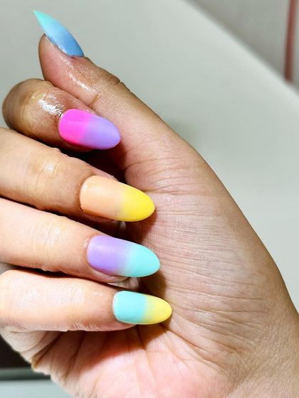 I'm obsessed with these matte ombré "candy" nails. The blend of pastel rainbow colors is so fun and perfect for summer.