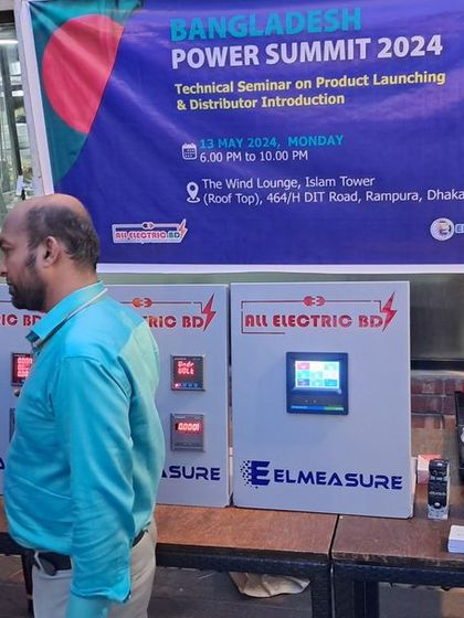 Discussing my metering solutions with an attendee at the Power Summit 2024 in Dhaka.