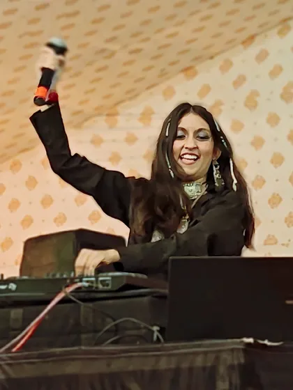Pure happiness. This photo captures my excitement as I hype up the crowd with the microphone.