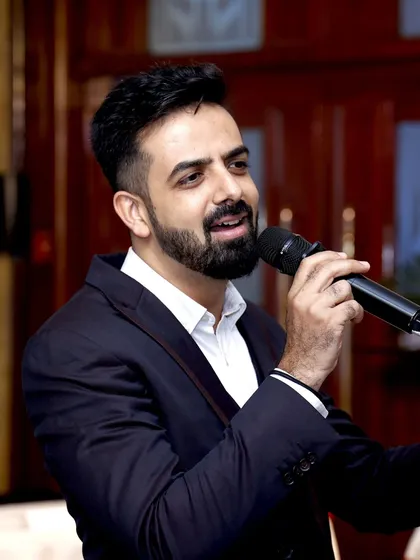 A professional shot of me speaking at the Fortis Hospitals R&R Night, where they celebrated their partners.