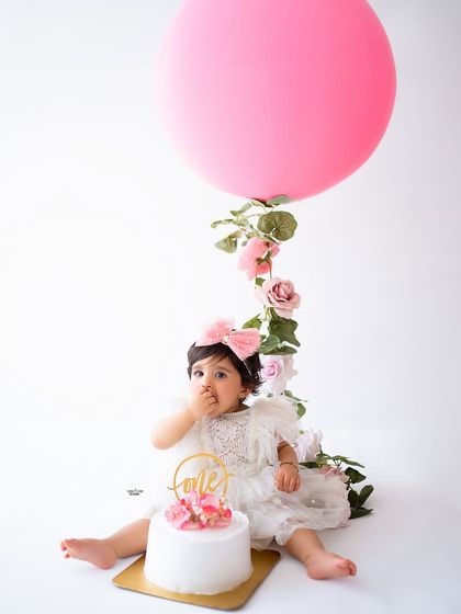 A simple and sweet cake smash moment for this little angel's first birthday.