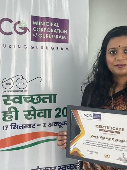 Our founder, Juhi, holding our certificate from the MCG for the 'Swachhata Hi Seva' campaign. This award is a tribute to every single volunteer and community member who has joined us in our mission.