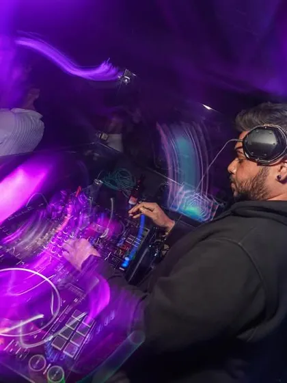 An overhead view of the decks, showing the complexity and artistry involved in a live mix.