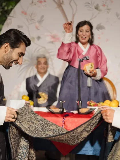 My expertise in fusion weddings allows me to honor diverse traditions with authenticity. Here, I planned a beautiful Korean Paebaek ceremony, seamlessly integrating the couple's cultural heritage into their Indian destination wedding.