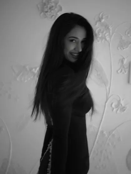 A playful moment captured during the 'Gustaakh Ishq' shoot. The movement in her hair adds a touch of spontaneity and life to this beautiful black and white image.