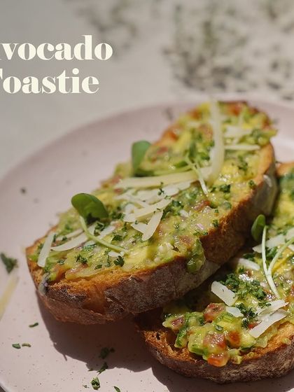 A classic done right. My Avocado Toastie features creamy mashed avocado on crisp toast, topped with a sprinkle of cheese and fresh herbs for a healthy and flavorful option.