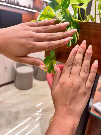 Another angle of the pink and shimmer nails, showing how they look from the side. The almond shape is so elegant.