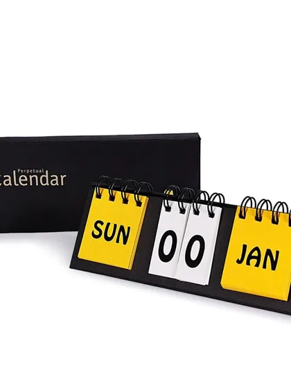 A branded perpetual calendar for Pratham, an education foundation. The bright yellow adds a pop of color to any desk.