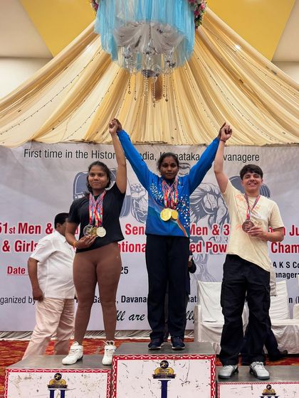 My student Sonia Dhaka on the podium, securing a bronze medal at her first Junior National Powerlifting Championship. Her hard work paid off on the national stage.