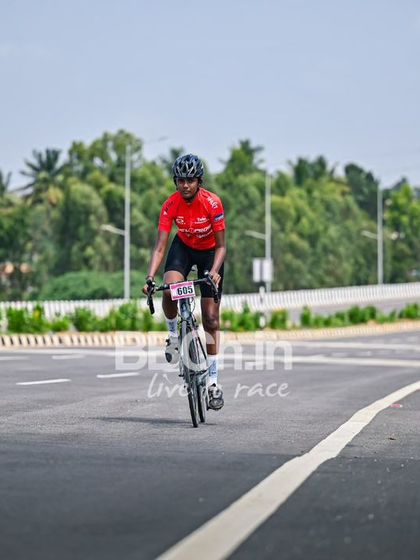 A young U-18 rider, focused and determined.