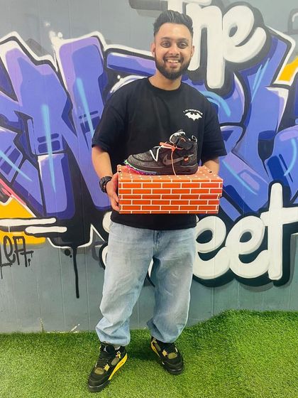 That smile says it all. Leaving the store with a fresh box and a new pair of grails.