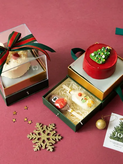 Gifting should feel special. My Christmas hampers are curated with a variety of my best treats, from mini cakes to cakesicles, all beautifully packaged to spread some Xtraordinary joy.
