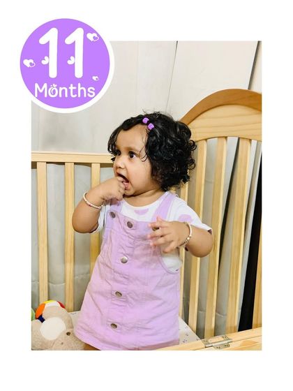 My daughter at 11 months old. Time is flying by, and she'll be one year old before I know it.