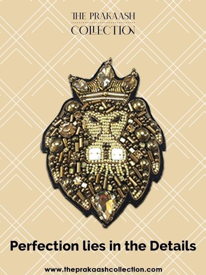 "Perfection lies in the Details." This image features our crowned lion patch, intricately made with beads and stones, showcasing the fine craftsmanship that goes into each piece.