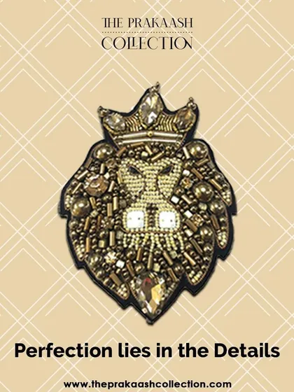 "Perfection lies in the Details." This image features our crowned lion patch, intricately made with beads and stones, showcasing the fine craftsmanship that goes into each piece.