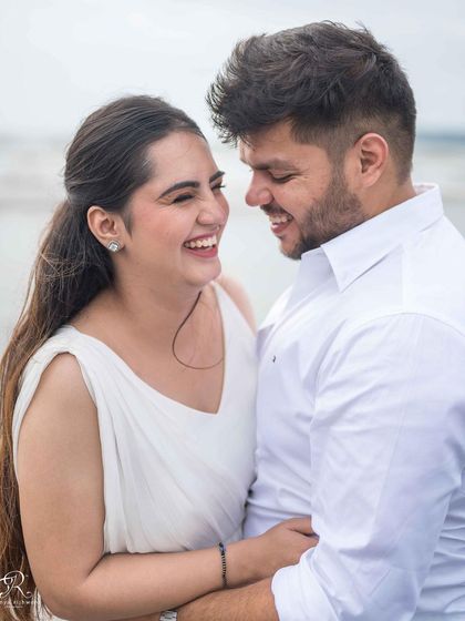 Another angle of their happy interaction. I often take a series of shots like this to ensure I capture the most authentic and flattering expressions of joy.