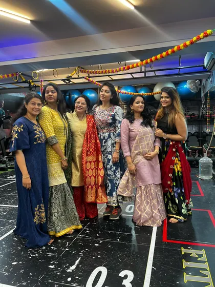 A beautiful group picture of our members enjoying the Garba Night festivities. The studio was filled with color, music, and dance.