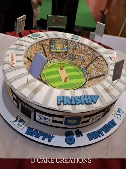 I brought the excitement of the game to life with this incredibly detailed cricket stadium cake for an 8th birthday. It features a packed stadium with thousands of edible sprinkles for the crowd, floodlights, and team logos, making it a home run for any cricket fan.
