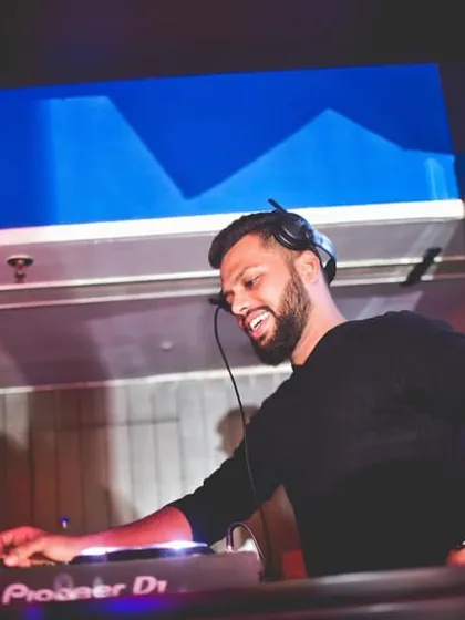 Live to work, work to party, party to live. A candid moment of me enjoying the music just as much as the crowd during a late-night club set.
