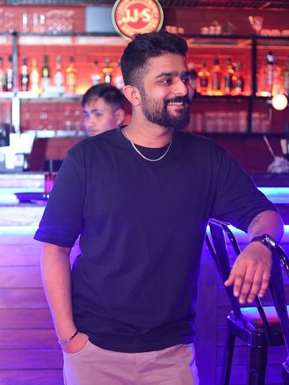 Worry less, smile more. A candid shot of me enjoying the atmosphere before a set.