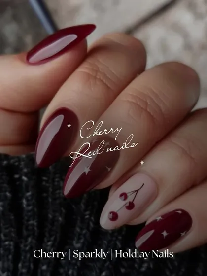 A sweet and playful design. This cherry red manicure features a cute cherry accent nail, adding a touch of fun to a classic color.