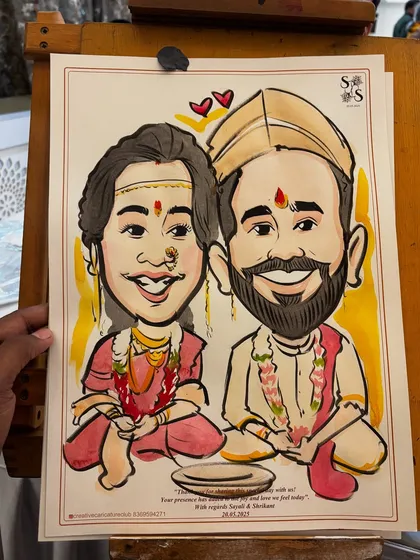 A close-up look at a custom wedding caricature, showing the detail in the traditional Maharashtrian attire and the vibrant watercolor finish. These make for a truly personal wedding gift.
