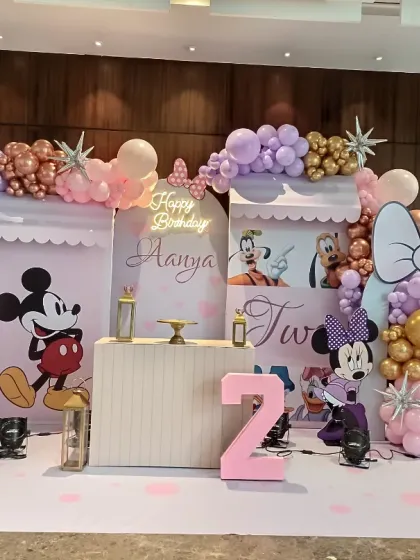 A stylish and modern Minnie and Mickey Mouse theme. The pastel purple and rose gold color palette gives a fresh twist to a classic theme for a 2nd birthday.