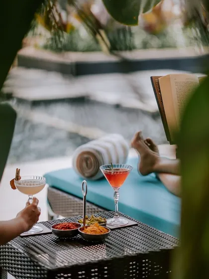 Your personal oasis awaits. Unwind by the poolside with a good book and a refreshing, garden-to-glass beverage, soaking in the sun and the peaceful atmosphere of the retreat. This is your time to simply be.