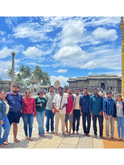 Our group at the magnificent Chennakesava Temple in Belur, an exquisite example of Hoysala architecture we visit on some of our heritage trips.