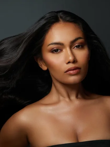 Another shot of this beautiful soft glam look, with the model's hair flowing to showcase the versatility of the makeup for different stylings.