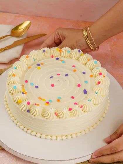 The cake that made birthdays feel special. My Vanilla with Belgian Dark Chocolate Cake from the Old School collection, with moist vanilla sponge, velvety ganache, and vanilla buttercream.