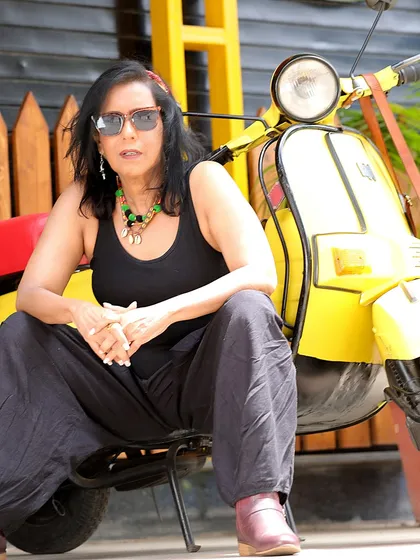 Swaroopa Ghosh showing her cool, edgy side with a vintage scooter. This demonstrates that an actor's portfolio can be both serious and playful.