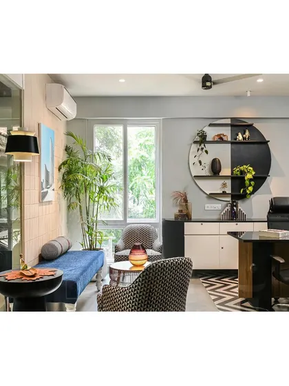 Our design approach extends to creating inspiring work environments. In the manager's cabin for Centennial College's Bangalore office, we blended formal and informal elements with a mix of patterns, textures, and a transparent layout to encourage interaction and creativity.
