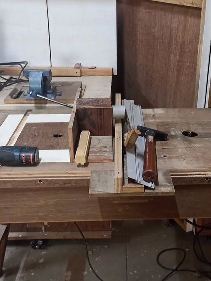 My folding router table setup. It has two routers installed, a smaller one for fine work and a larger one for heavy-duty cuts.